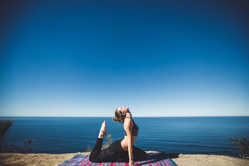 Person practicing yoga